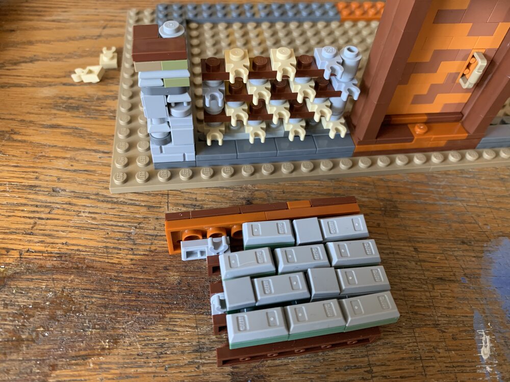1x2 and 1x3 plates behind the ingots and tiles make up the conection points